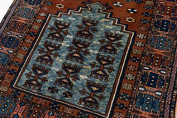 A semi-antique Anatolian rug, c. 127 x 117 cm.