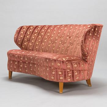 A mid-20th-century sofa.