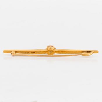 BROSCHNÅL, 18K guld. 1902.