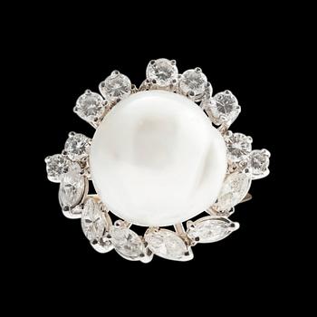 360. A RING, 18K white gold. Brilliant- and navette cut diamonds c. 1.05 ct H/vs. Baroque south sea pearl 12 mm.