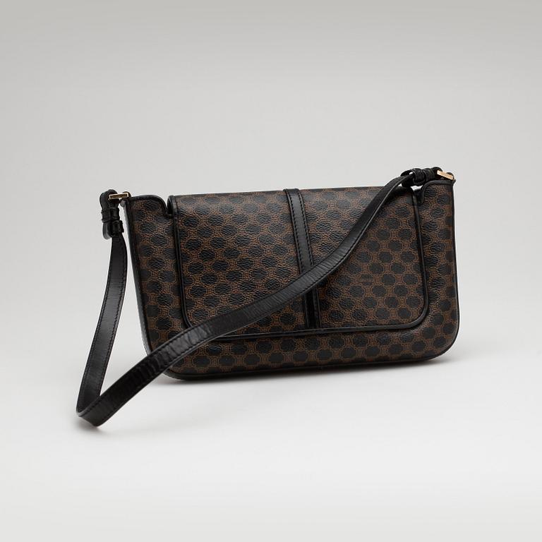 CÉLINE, a brown and black monogram canvas shoulder bag.