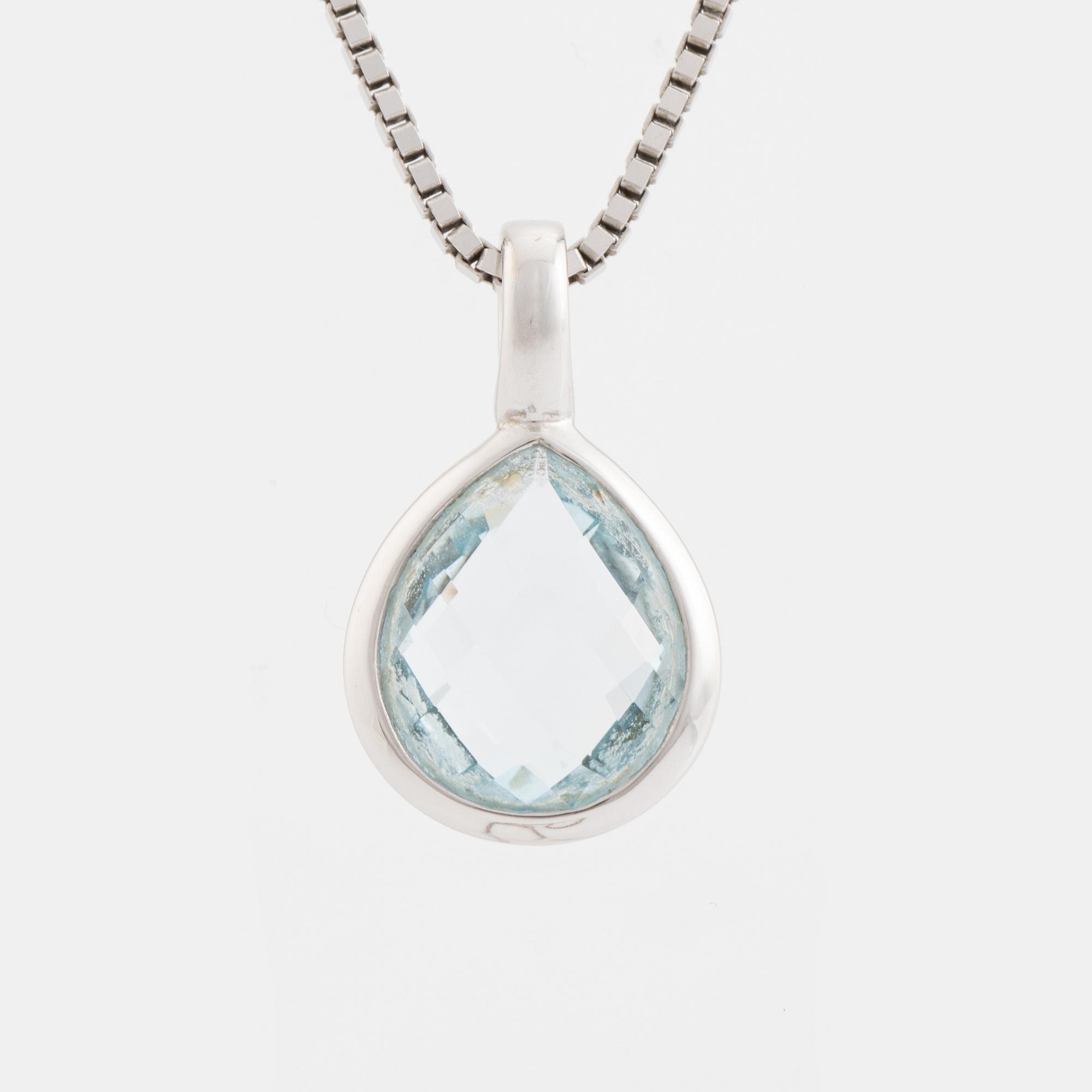 Pendant, Golden Lady, white gold with topaz.