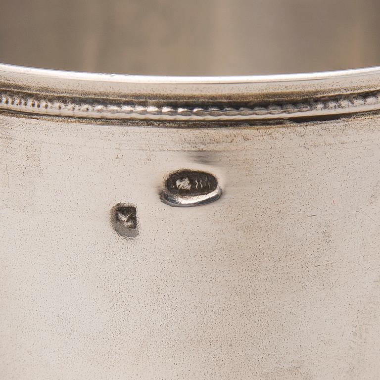 Two tea glass holders in silver, one with mark of Ivan Saltykov, Moscow 1889, the other one marked Moscow 1908-1917.