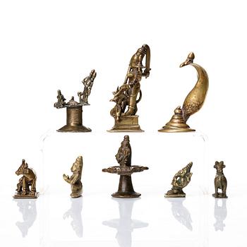 A group of eight brass miniatures, India, 19th/20th Century.