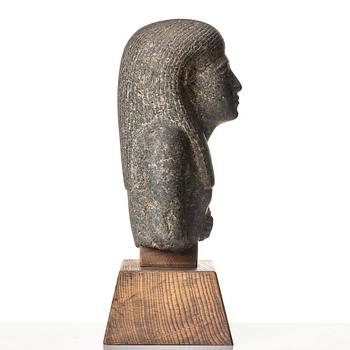 An Egyptian black granite bust of a man, 19th century or older.
