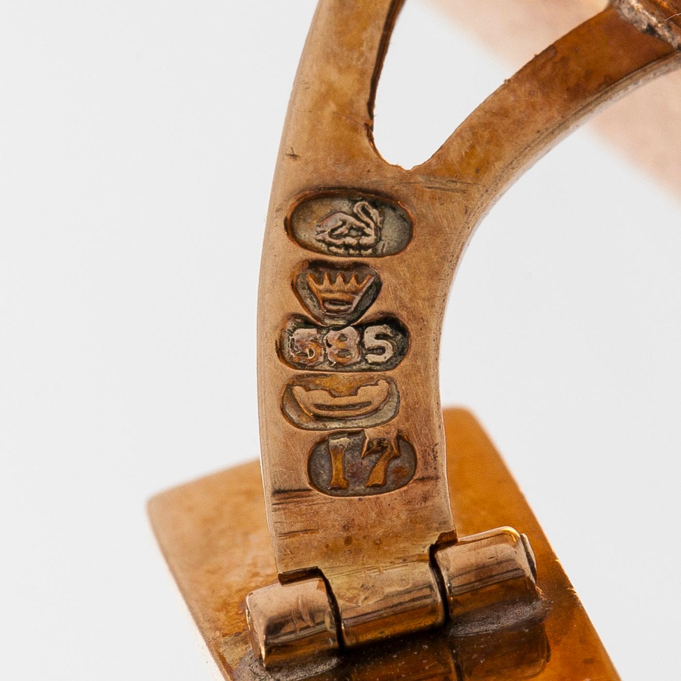 Kalvosinnapit, 14K kultaa ja hematiitit, Kaisaniemen Kello ja Kulta 1962.