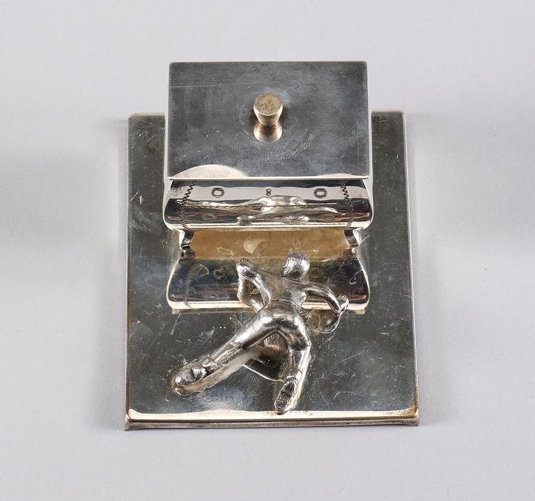 MANSCHETTKNAPPSASK, Eskilstuna, 1900-talets andra hälft.