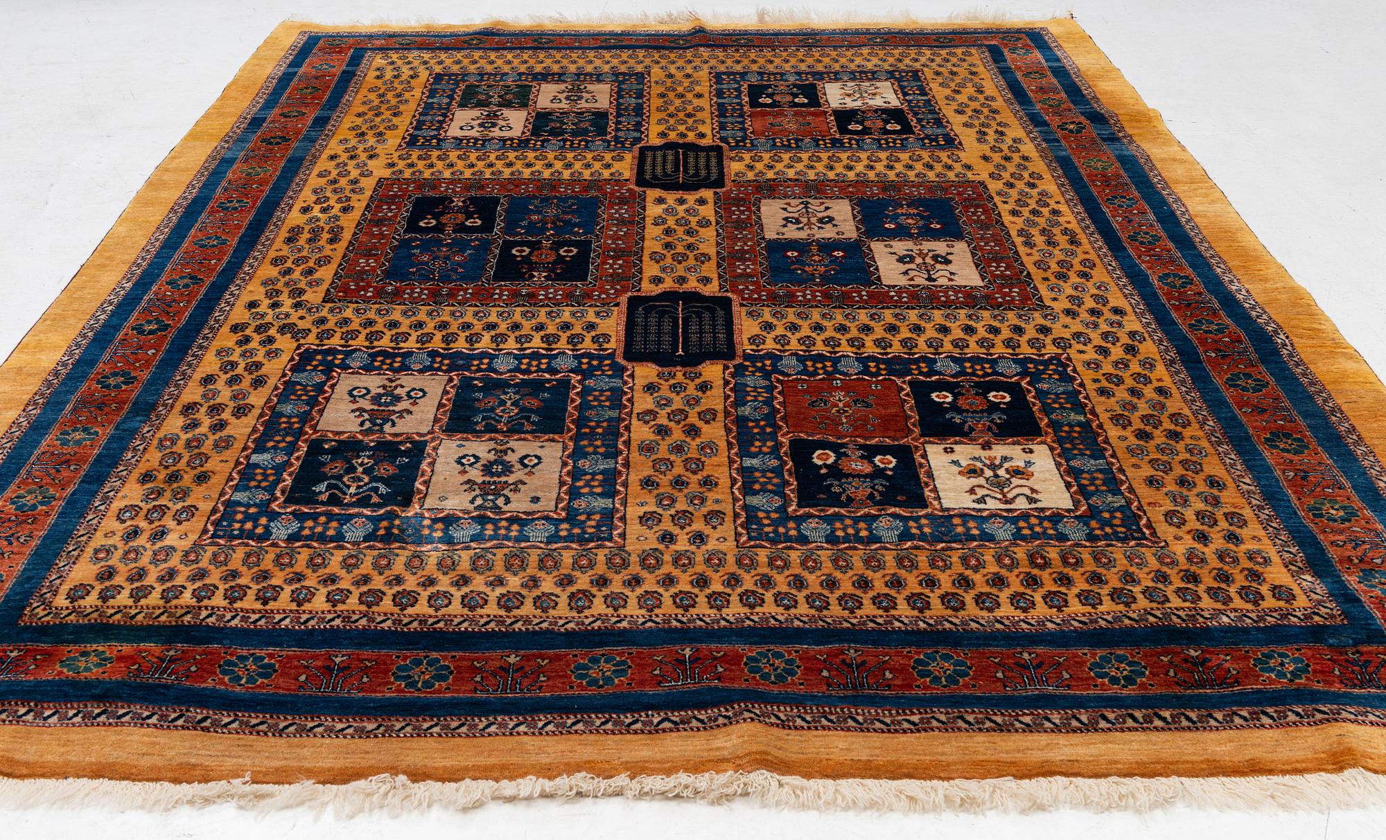 An oriental 'garden' carpet of Safavid design probably from the Shiraz area, Iran, c 343 x 254 cm.