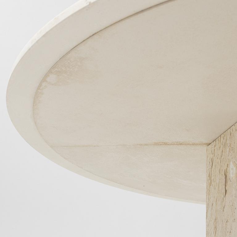 A travertine  'Epic Dining Table' from Gubi.