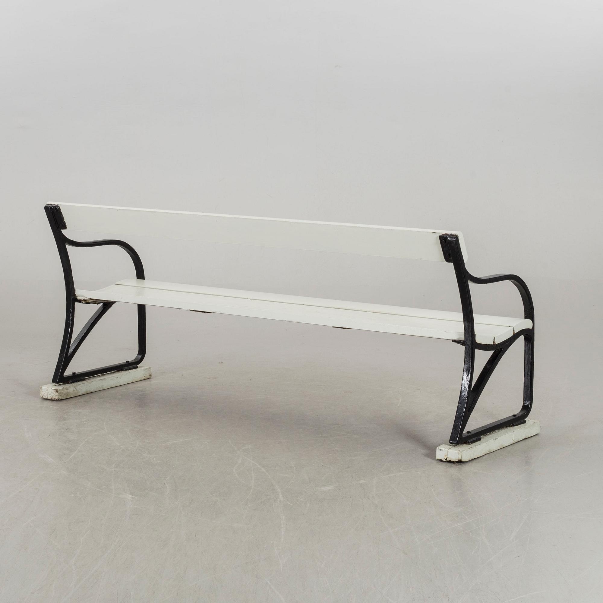 A cast iron garden sofa ends by Folke Bensow, Näfveqvarns Bruk, early 20th century.