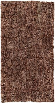 A carpet, sheepskins, brown red camel coloured melange, ca 985 x 541,5 cm.