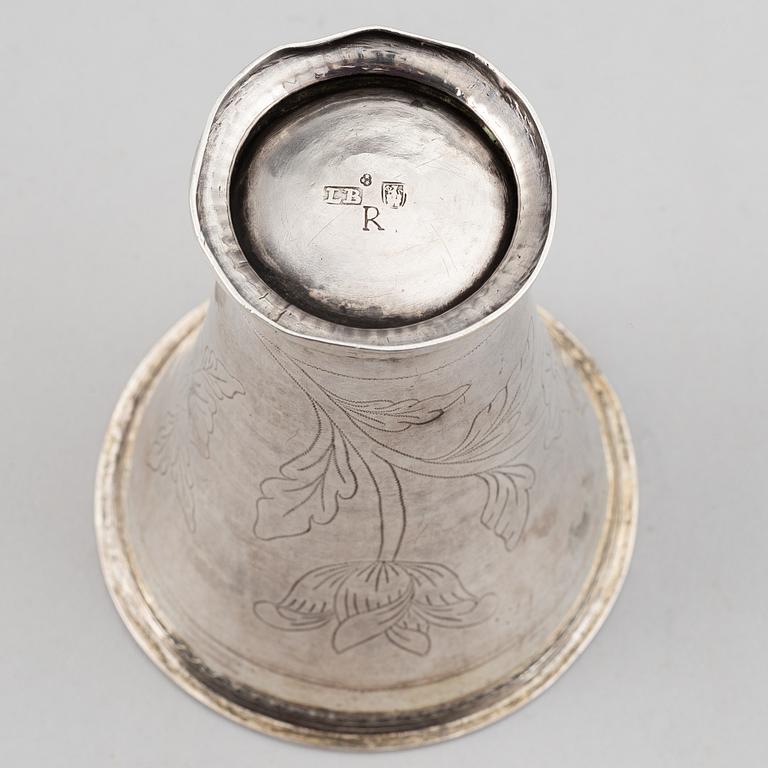 A silver creamer, beaker, and platter, Sweden, 18-19th century.