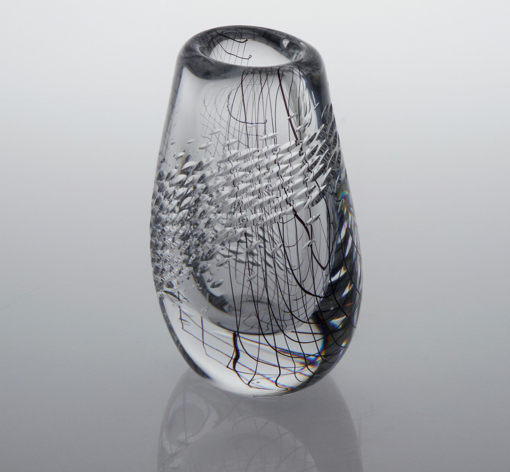 A glass vase by Vicke Lindstrand for Kosta, signed and dated 1955.