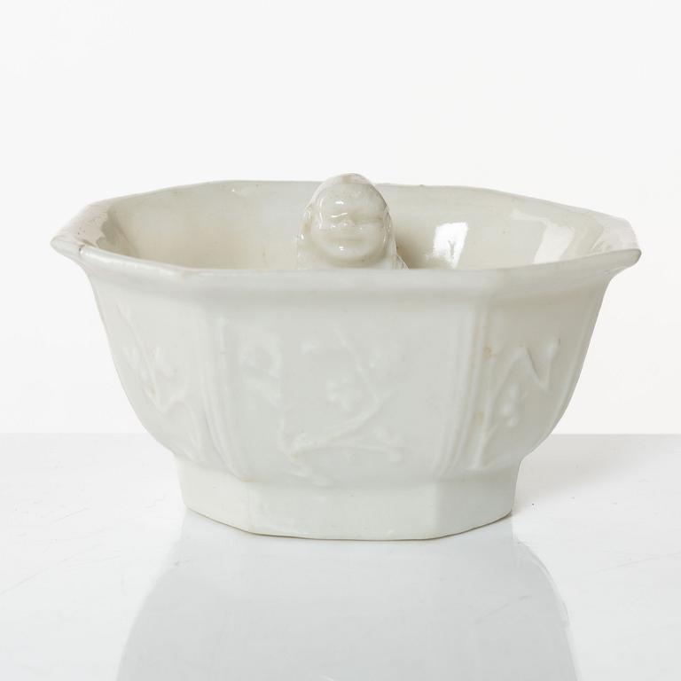 A blanc de chine wine cup, Qing dynasty, Kangxi (1662-1722).