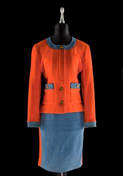 1244. A two-piece orange bouclé and denim costume by Chanel.