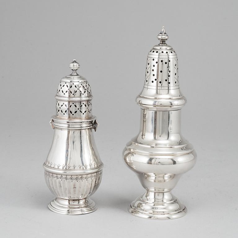 Two silver sugar casters and a silver bowl. Late 19th and 20th century.