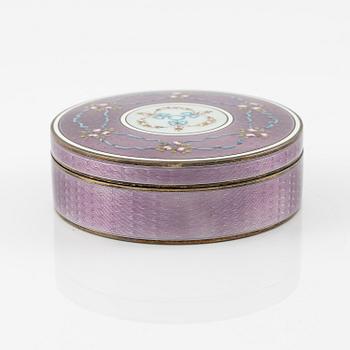 A German 19th century silver gilt and enamel guilloche box with lid.