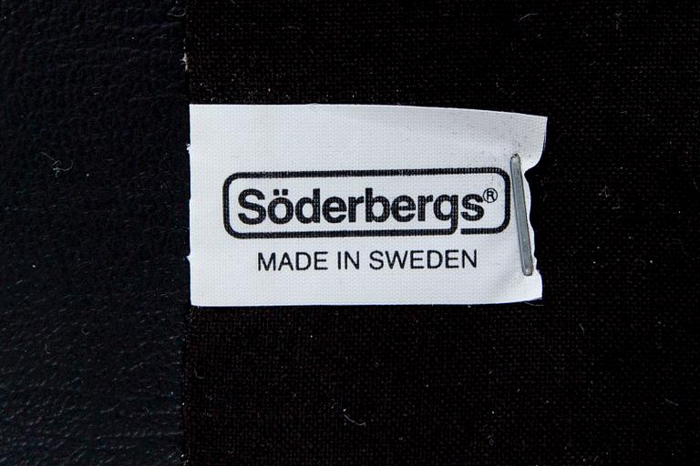 A leather swivel armchair and stool, Söderbergs  1980s.