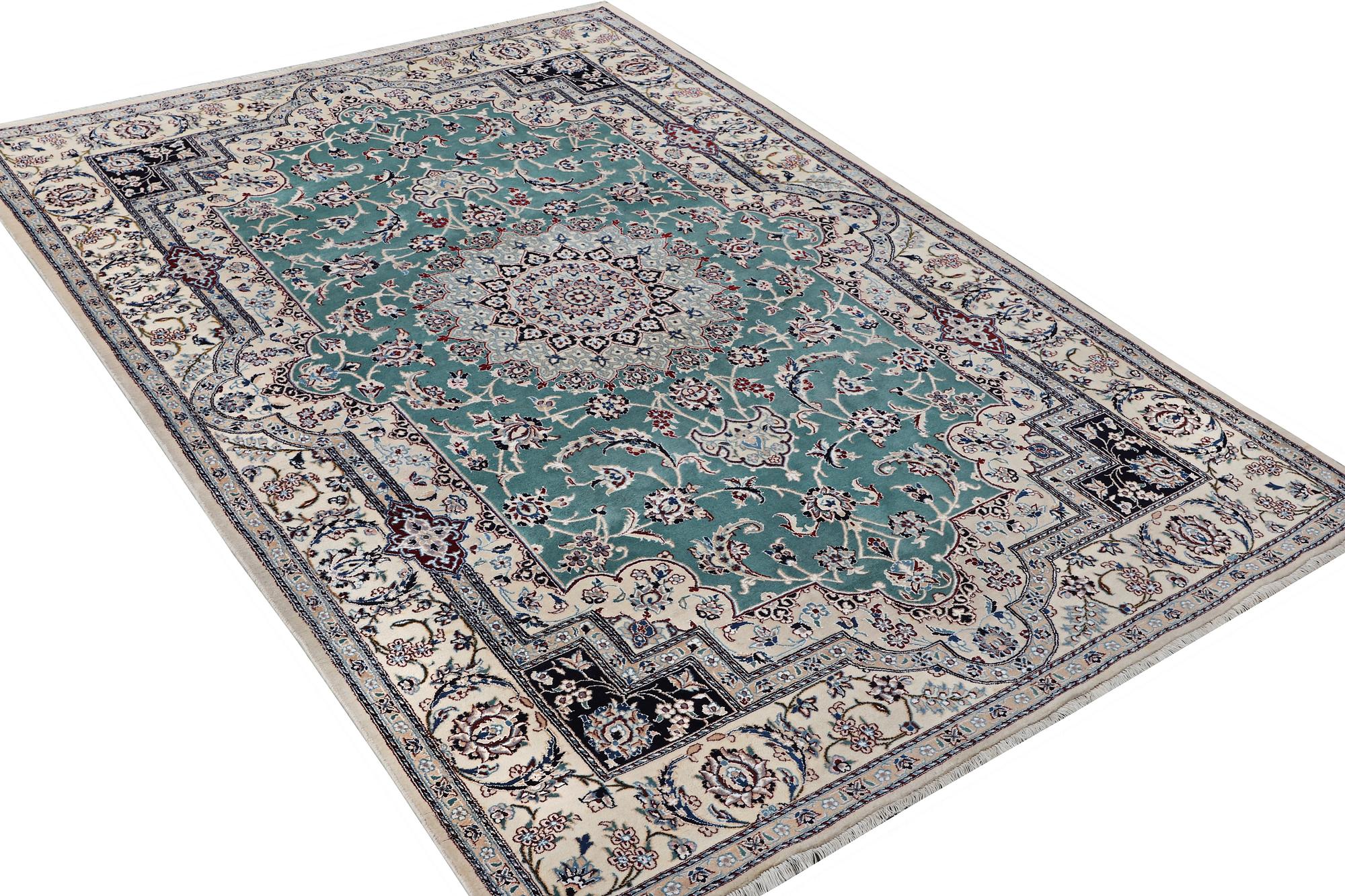 A Nain carpet, part silk, 6 laa, ca. 300 x 201 cm.