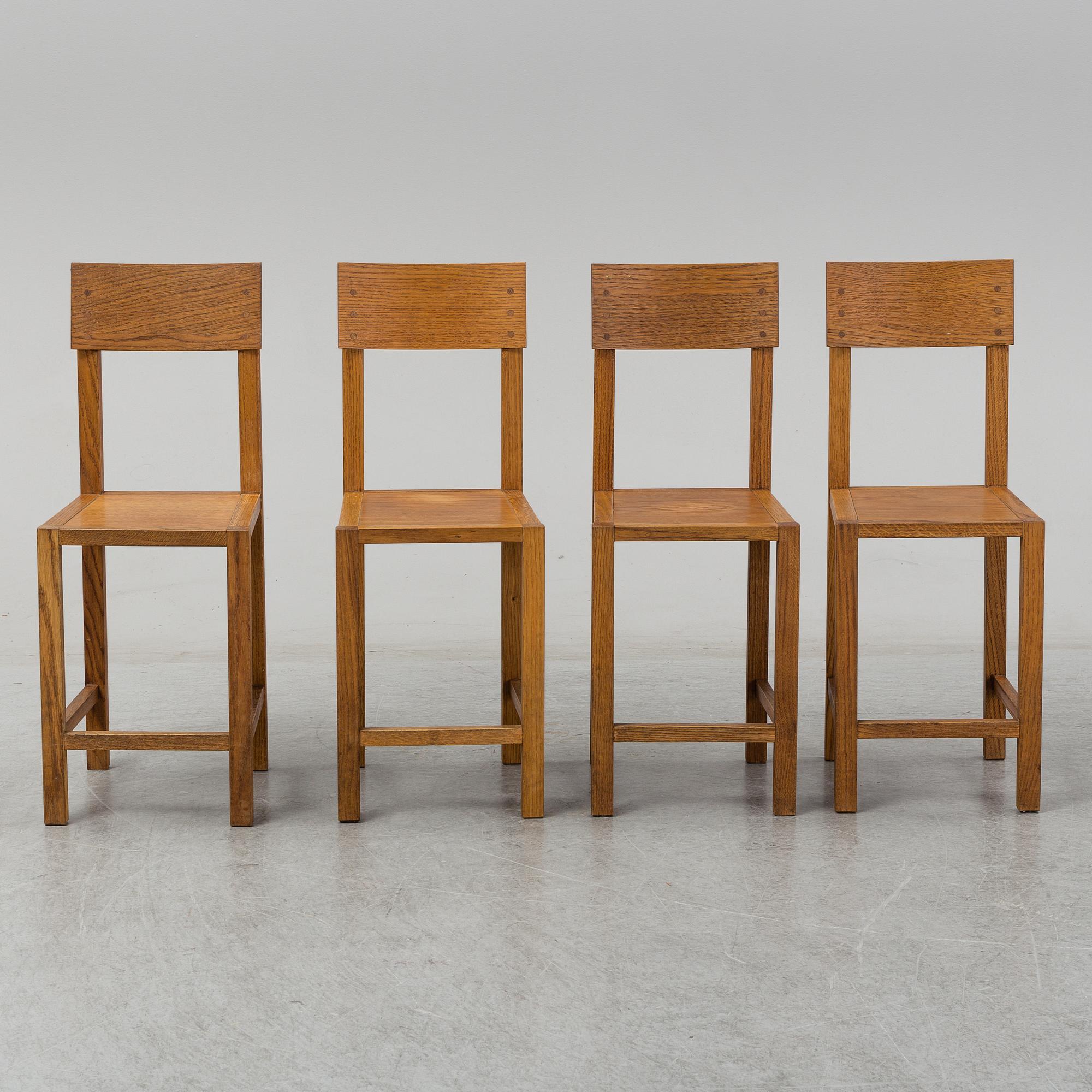 MARIO PRANDINA, an oak table and four chairs, Plinio Il Giovane, Italy.