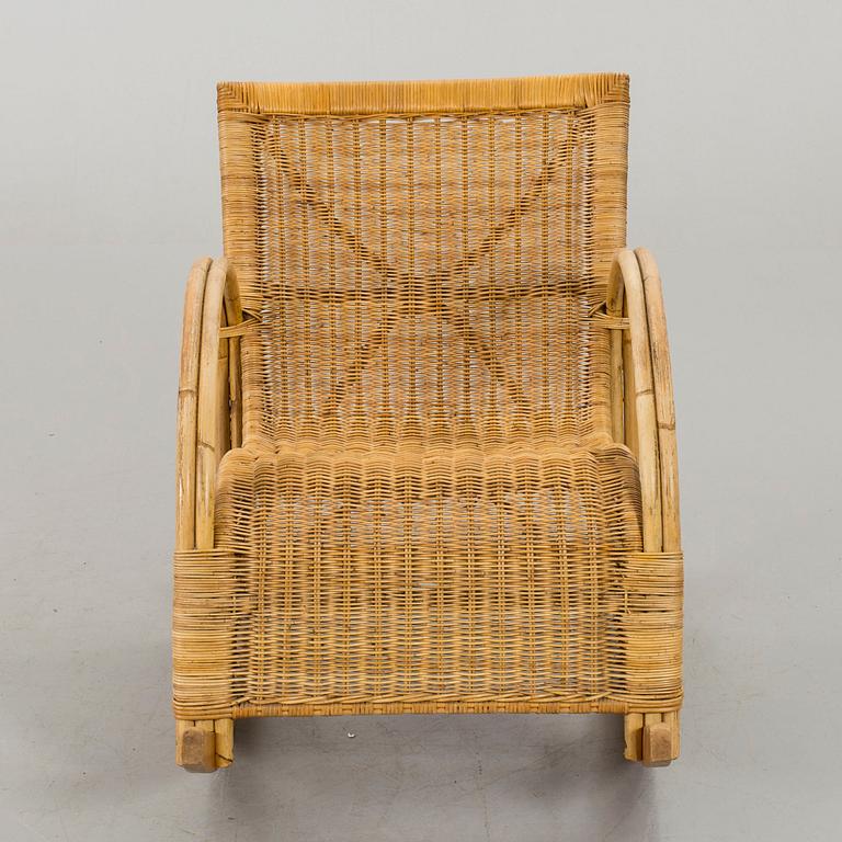 A ROCKING CHAIR, first half of 20th century.