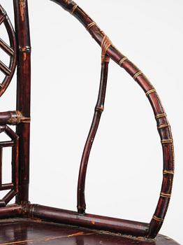 A Chinese bamboo horseshoeback armchair, late Qing dynasty.