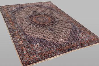 A carpet, Moud, signed, ca 385 x 268 cm.