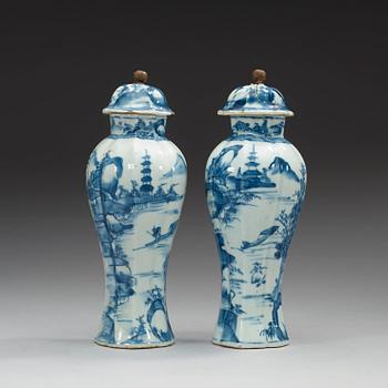 A pair of blue and white vases with covers, Qing dynasty, Kangxi (1662-1722).