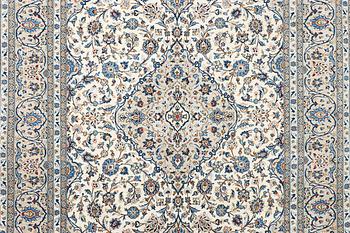 A Kashan carpet, c. 355 x 238 cm.