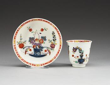 A Meissen 'Tischen müster' cup with saucer, ca 1735.