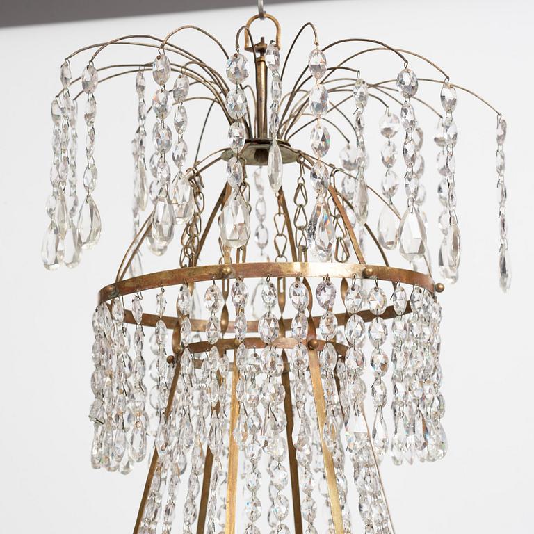A late Gustavian nine-light gilt brass and cut glass chandelier, Stockholm, late 18th century.