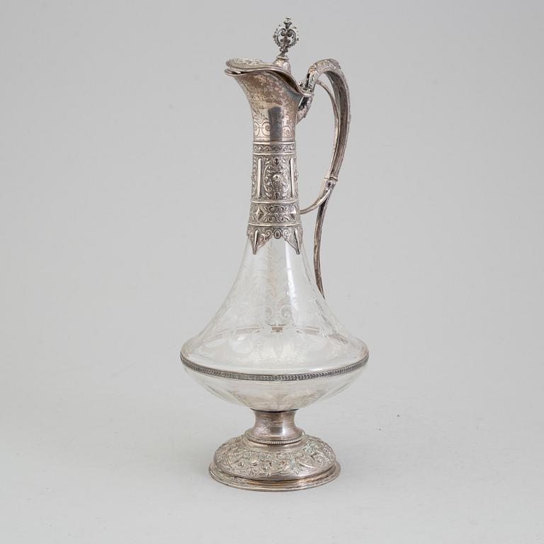 A glass and silver caraffe by Gustaf Möllenborg, Stockholm 1881.