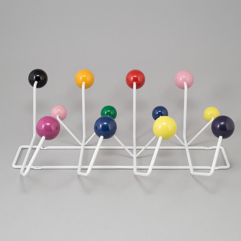 a "Hang it all" clothes hanger by Charles & Ray Eames for Vitra.