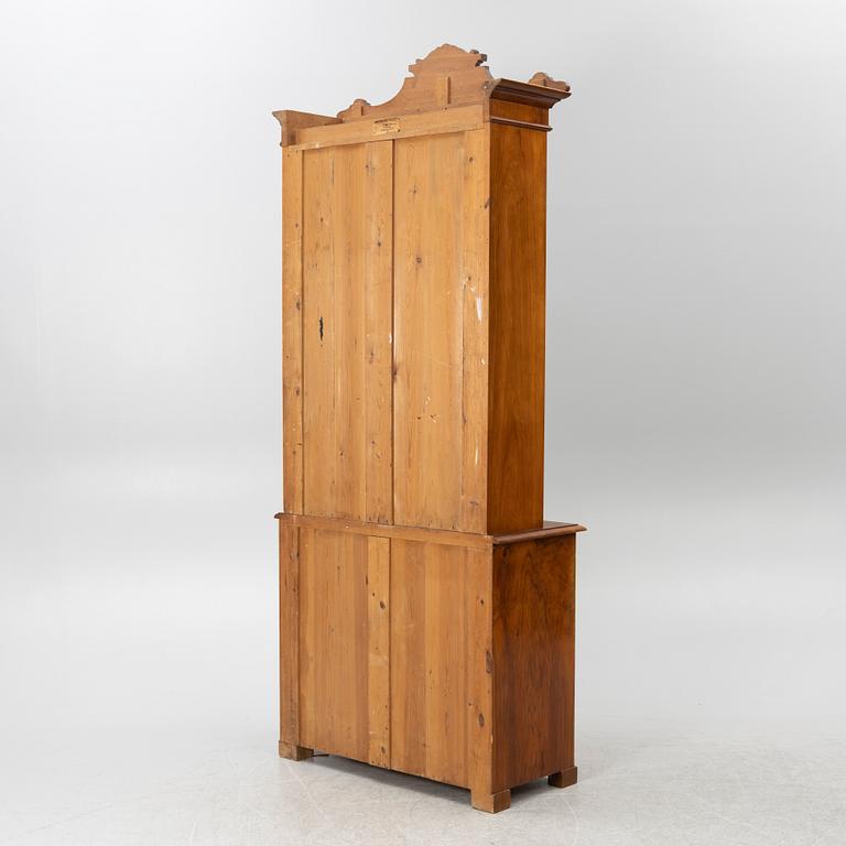 A Neo-Renaissance bookcase, circa 1900.