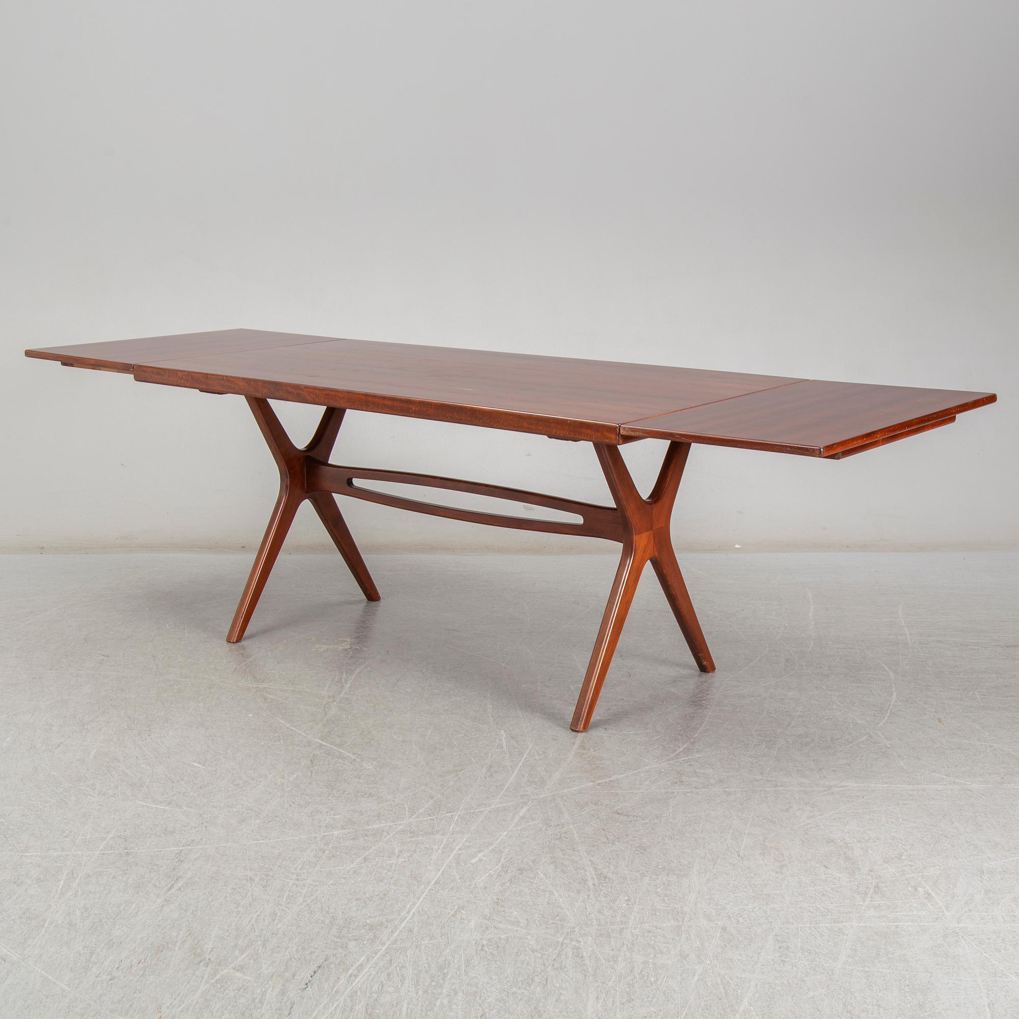 A mid 20th Century dinner table.