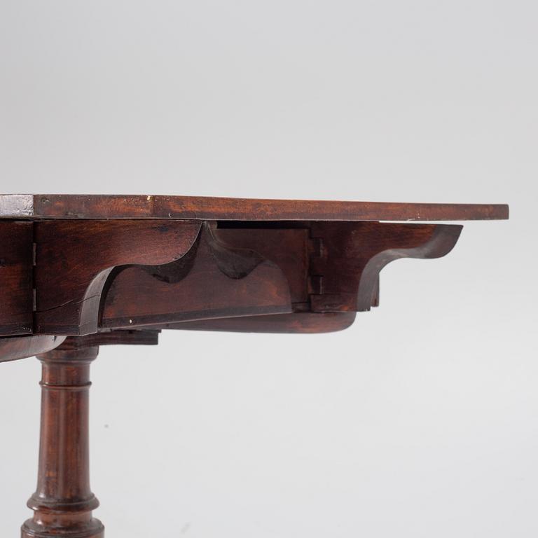 A pair of tables, England, early 19th century.