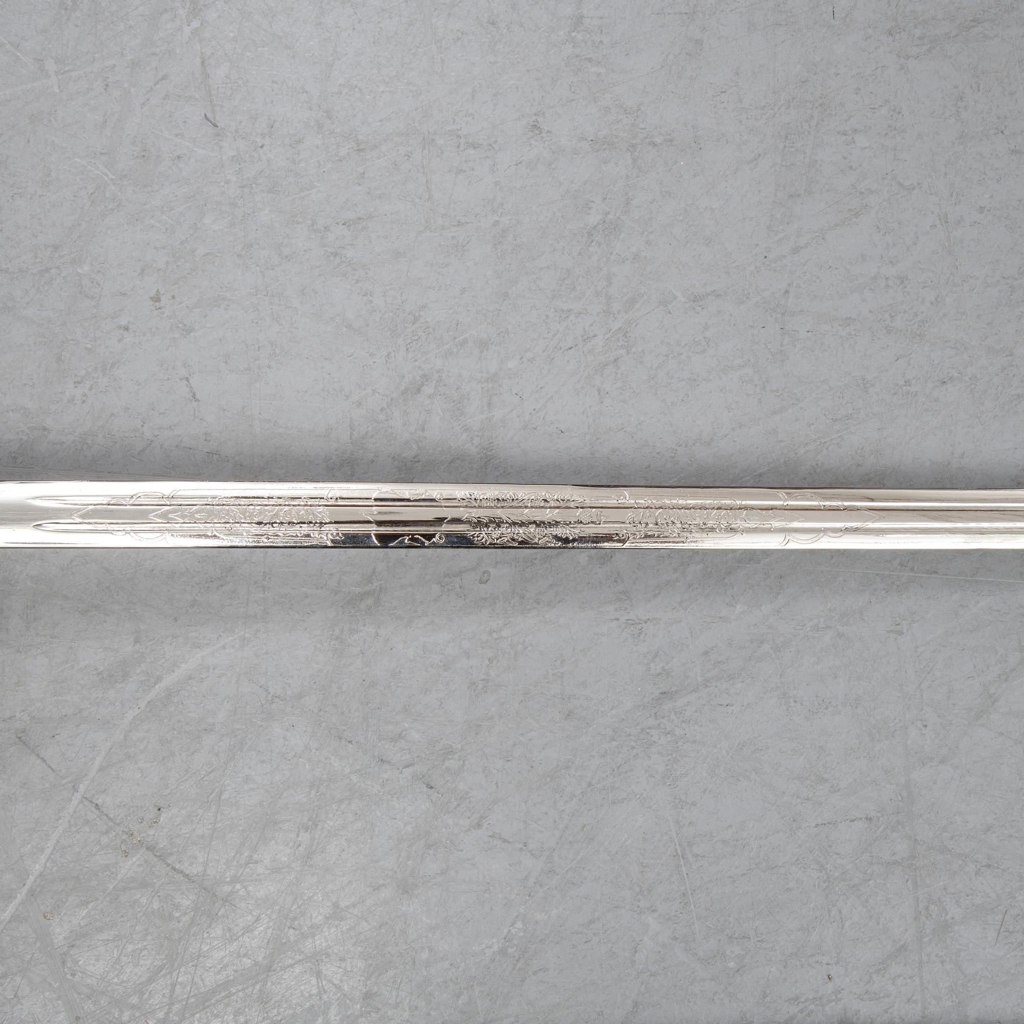 A Regulation Basket hilted broadsword for Highland officers, with scabbard, late 20th Century.