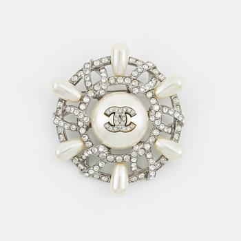 Chanel, a silvermetal, imitation pearl and crystal brooch, 2018.