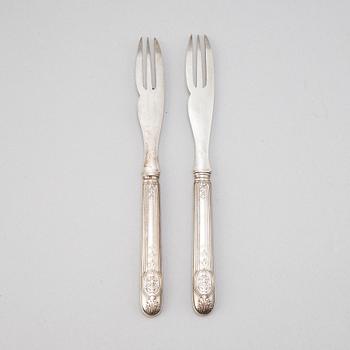 A set of twelve French 19th century silver lobster forks.