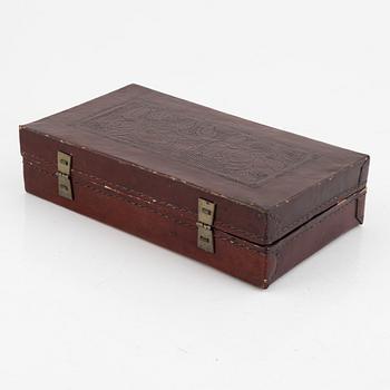 A Chinese leather box, late Qing dynasty.