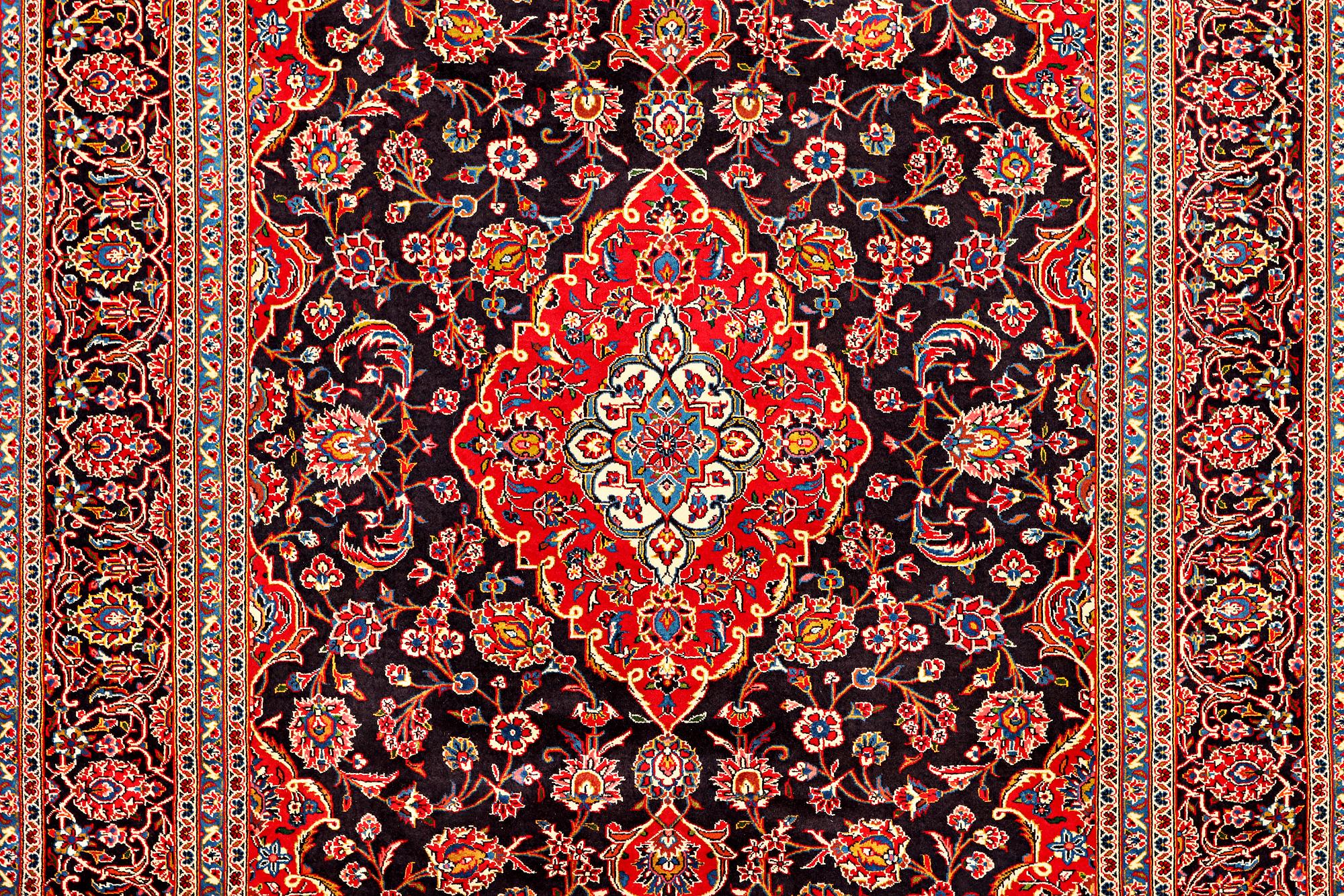 A Keshan carpet, c. 373 x 260 cm.