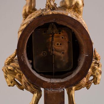 A PENDULUM CLOCK, first half of the 19th century.