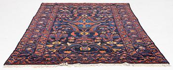 A semi-antique Khoigân village carpet, Feridan area, ca 314 x 209 cm.