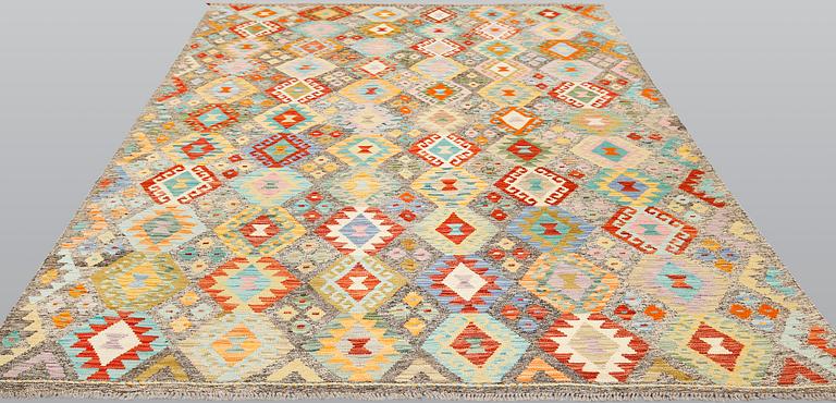 A Kilim carpet, ca 298 x 210 cm.