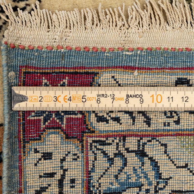 A semi-antique pictoral Kashan rug, Central Persia, c. 206 x 138 cm.