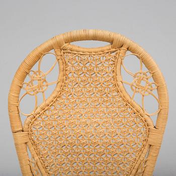 A pair of second half of the 20th cnetury rattan chairs.