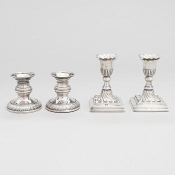 Two pairs of silver candlesticks, England 1889 and Finland 1975.