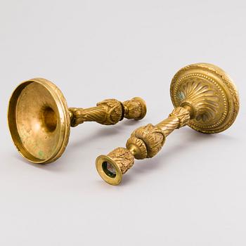 A pair of 19th century brass candlesticks, probably France.