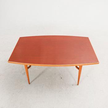 A 1960s teak coffee table.