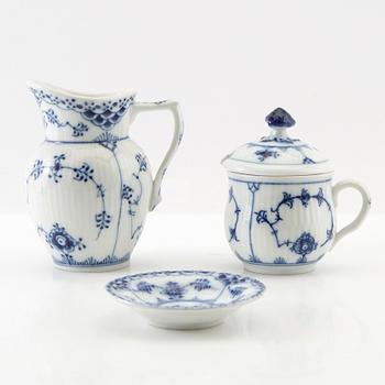 Service approximately 42 pieces "Musselmalet rifflet/halvblonde" Royal Copenhagen Denmark porcelain first half of the 20th century.